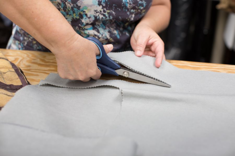 Fabric being cut for a garment lining at LaBelle
