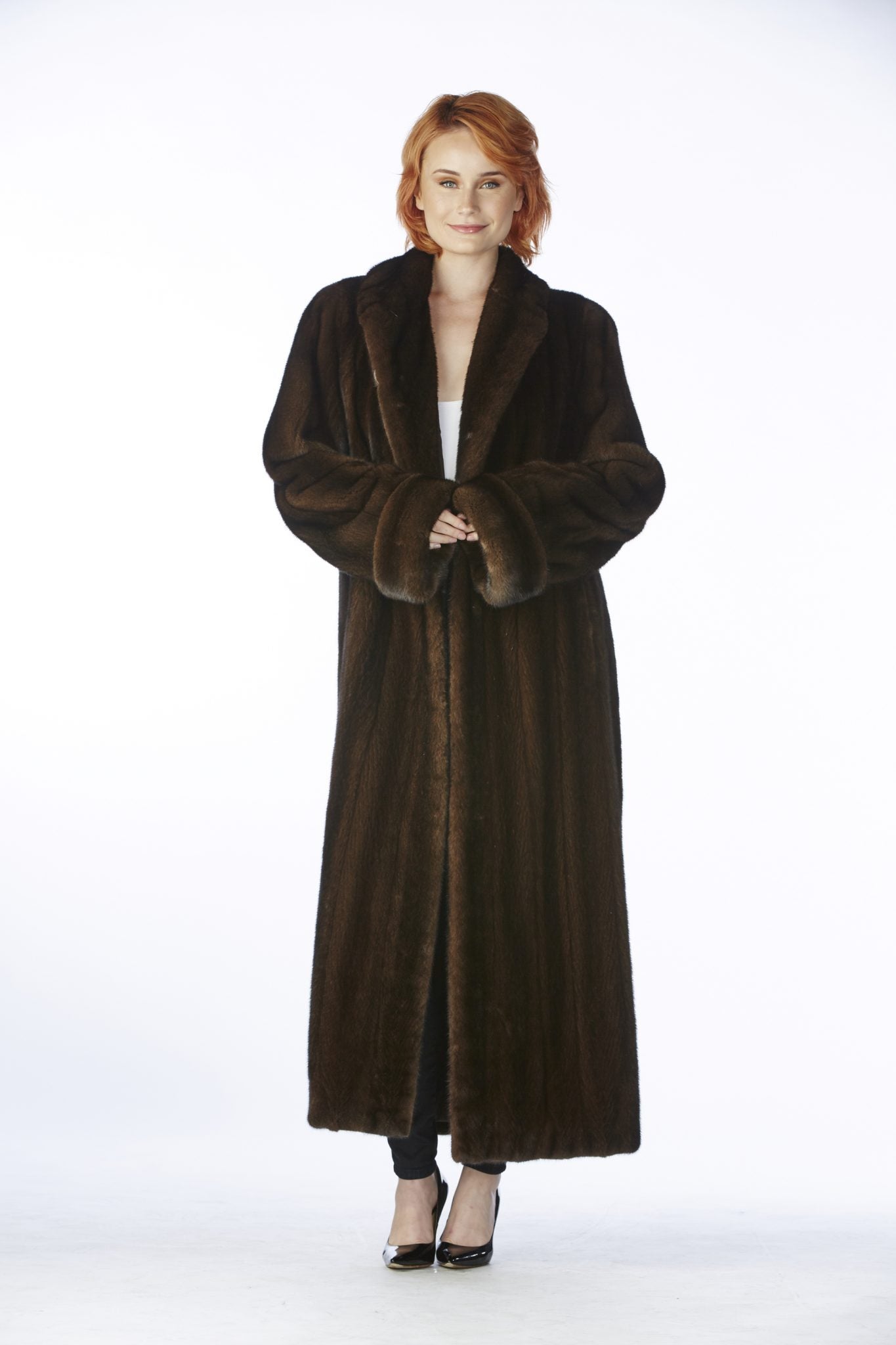 women wearing a full length mink coat